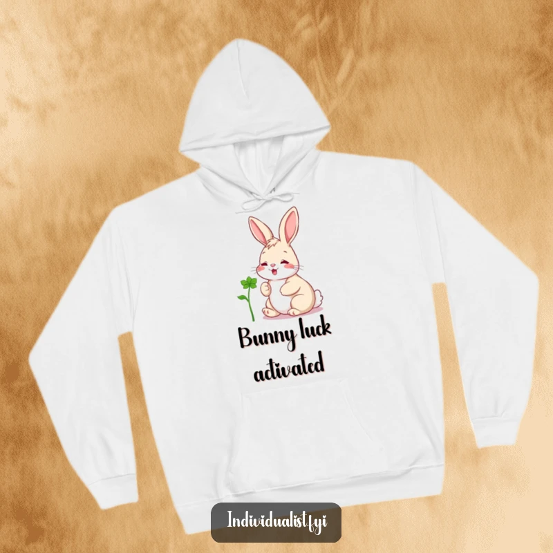 Funny hoodie showing a beaming rabbit cherishing a one-of-a-kind clover, a symbol of joy and good luck.