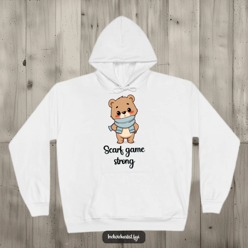 Funny hoodie depicting a confident bear cub wearing a chic scarf and posing stylishly, perfect for warm, humorous comfort.