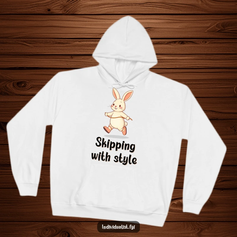 Funny hoodie featuring a happy rabbit skipping rope solo, wearing mismatched socks, ideal for comfort and a touch of whimsy.