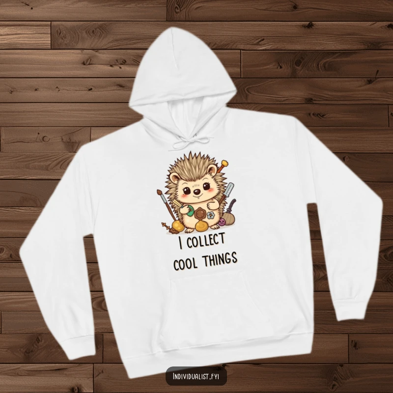 Funny Hoodie: A proud hedgehog proudly exhibits a collection of unusual items, symbolizing a love for discovery and uniqueness.