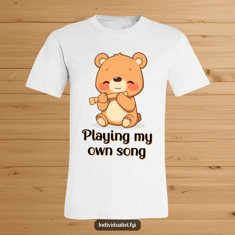 Funny t-shirt depicting a happy bear cub playing a small flute, radiating pure musical delight.