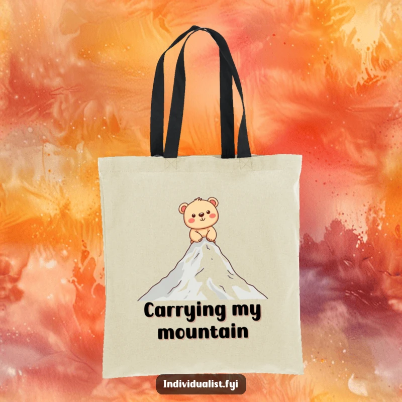 Funny bear cub tote bag showcasing a happy cub climbing a small mountain, perfect for carrying essentials with a smile.